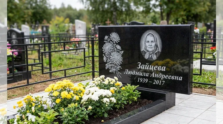 Памятник с гравировкой хризантем — выполненная работа «Зайцева» в Магнитогорске