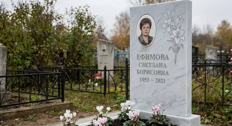 Памятник с гравировкой лилий — выполненная работа «Ефимова» в Магнитогорске