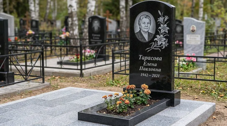 Памятник с гравировкой лилий — выполненная работа «Тарасова» в Магнитогорске