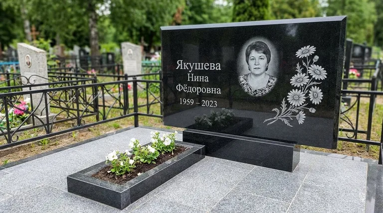 Памятник с гравировкой ромашек — выполненная работа «Якушева» в Магнитогорске