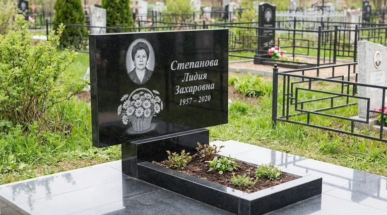 Памятник с гравировкой ромашек — выполненная работа «Степанова» в Магнитогорске