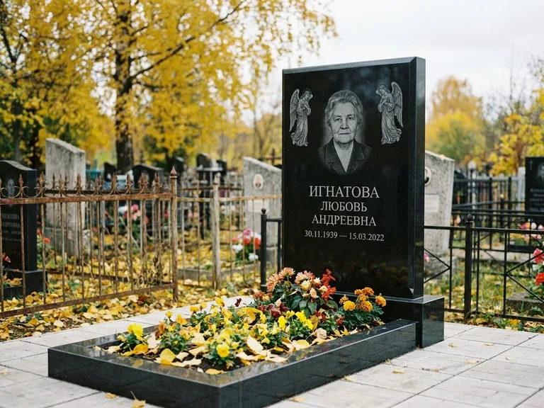 Памятник с гравировкой ангела — гравировка двух ангелов по сторонам портрета, работа «Игнатова» в Магнитогорске